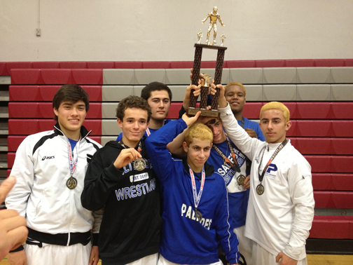 Members of the PaliHi wrestling team with their regional finals trophy. Front row, from left: Brad Boorstin, Kevin Rosen, David Rheingold and Jesse Rheingold. Back row, from left: Holland Herzfeld, Nick Ewbank and Kenny Jones.